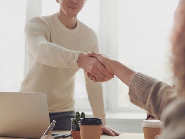 nurse and recruiter making a deal