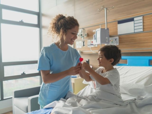 nurse with prediatric patient